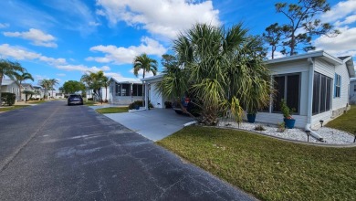 Nestled within the highly sought-after golf course community of on Blue Heron Pines Golf Course in Florida - for sale on GolfHomes.com, golf home, golf lot