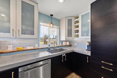 Welcome to a rare Mid-Century Modern tri-level gem in the highly on Seminole Lake Country Club in Florida - for sale on GolfHomes.com, golf home, golf lot