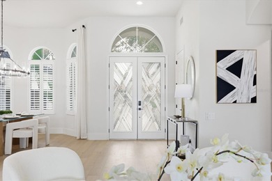 Welcome to an extraordinary, fully remodeled residence in the on University Park Country Club in Florida - for sale on GolfHomes.com, golf home, golf lot