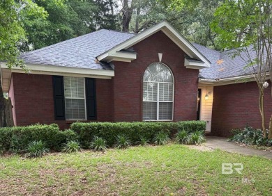 This BRICK one story home is located on a vibrant tucked away on Lake Forest Yacht and Country Club in Alabama - for sale on GolfHomes.com, golf home, golf lot