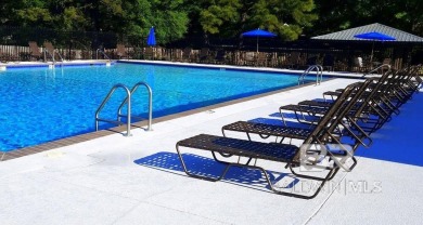 This BRICK one story home is located on a vibrant tucked away on Lake Forest Yacht and Country Club in Alabama - for sale on GolfHomes.com, golf home, golf lot