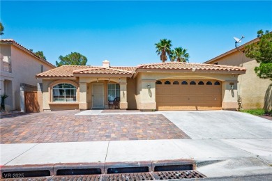 Popular one story home in the NW -- 3 BR, 2 BA, 2-car garage on Durango Hills Golf Club in Nevada - for sale on GolfHomes.com, golf home, golf lot