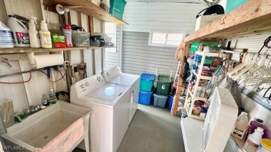 Welcome to this charming and well-maintained manufactured home on Riverbend Golf and Country Club in Florida - for sale on GolfHomes.com, golf home, golf lot