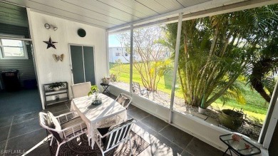 Welcome to this charming and well-maintained manufactured home on Riverbend Golf and Country Club in Florida - for sale on GolfHomes.com, golf home, golf lot