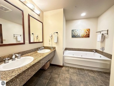 Updated 1 bedroom suite at The Lodge at Cedar River Village on Cedar River Golf Course in Michigan - for sale on GolfHomes.com, golf home, golf lot