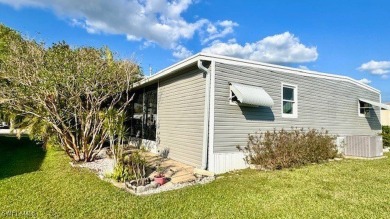 Welcome to this charming and well-maintained manufactured home on Riverbend Golf and Country Club in Florida - for sale on GolfHomes.com, golf home, golf lot