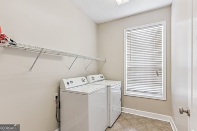 This charming duplex home for sale offers excellent curb appeal on Laurel Island Links in Georgia - for sale on GolfHomes.com, golf home, golf lot