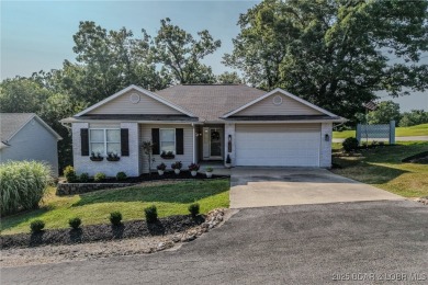 Just remodeled with high-end finishes, this beautiful home on The Oaks Golf Course in Missouri - for sale on GolfHomes.com, golf home, golf lot