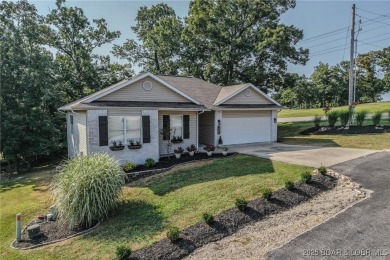 Just remodeled with high-end finishes, this beautiful home on The Oaks Golf Course in Missouri - for sale on GolfHomes.com, golf home, golf lot
