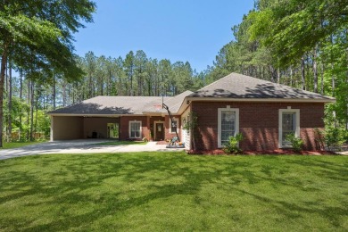 Welcome to your dream home in the serene Beaver Lake Subdivision on Pine Creek Golf Club in Mississippi - for sale on GolfHomes.com, golf home, golf lot