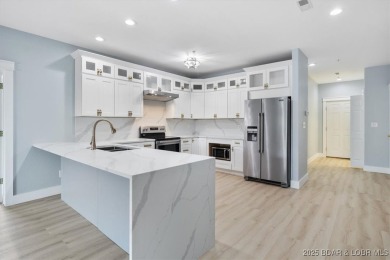 This beautifully updated 3 bed, 2 bath end unit in the quiet on The Club At Old Kinderhook in Missouri - for sale on GolfHomes.com, golf home, golf lot
