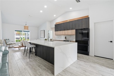 Luxury Waterfront Living in the Heart of Cape Coral's on Royal Tee Country Club in Florida - for sale on GolfHomes.com, golf home, golf lot