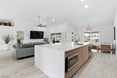 Luxury Waterfront Living in the Heart of Cape Coral's on Royal Tee Country Club in Florida - for sale on GolfHomes.com, golf home, golf lot