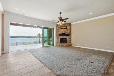 Welcome to this exquisite 5-bedroom, 4-bathroom on The Golf Club at Resort Eagle Mountain Lake in Texas - for sale on GolfHomes.com, golf home, golf lot