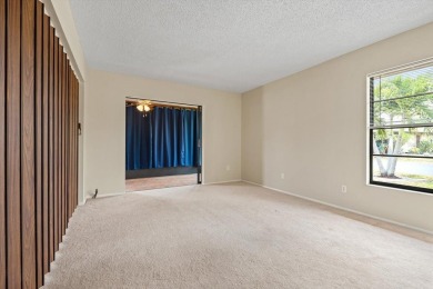 Discover the perfect blend of comfort, convenience, and coastal on Timber Creek Golf Course in Florida - for sale on GolfHomes.com, golf home, golf lot