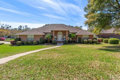Welcome to this beautifully maintained 4 bedroom, 3 bath home on Scenic Hills Country Club in Florida - for sale on GolfHomes.com, golf home, golf lot