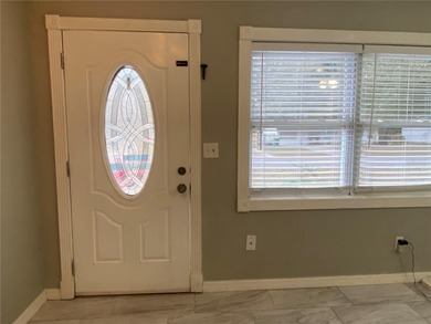 Charming and move-in ready block single family home featuring 2 on Zephyrhills Municipal Golf Course in Florida - for sale on GolfHomes.com, golf home, golf lot