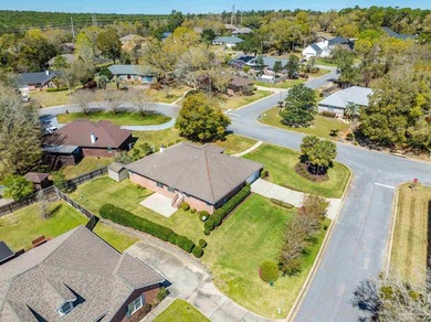 Welcome to this beautifully maintained 4 bedroom, 3 bath home on Scenic Hills Country Club in Florida - for sale on GolfHomes.com, golf home, golf lot