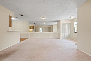 Discover the perfect blend of comfort, convenience, and coastal on Timber Creek Golf Course in Florida - for sale on GolfHomes.com, golf home, golf lot