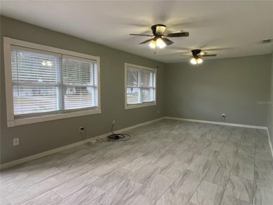 Charming and move-in ready block single family home featuring 2 on Zephyrhills Municipal Golf Course in Florida - for sale on GolfHomes.com, golf home, golf lot