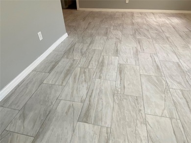 Charming and move-in ready block single family home featuring 2 on Zephyrhills Municipal Golf Course in Florida - for sale on GolfHomes.com, golf home, golf lot