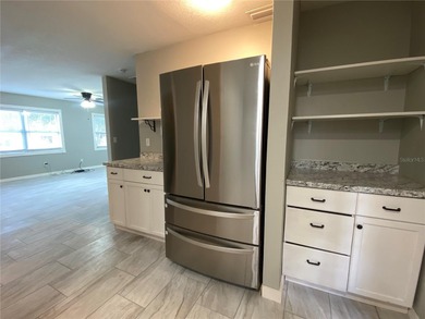 Charming and move-in ready block single family home featuring 2 on Zephyrhills Municipal Golf Course in Florida - for sale on GolfHomes.com, golf home, golf lot