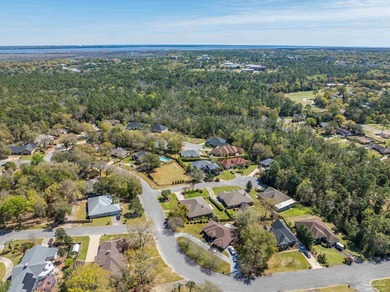 Welcome to this beautifully maintained 4 bedroom, 3 bath home on Scenic Hills Country Club in Florida - for sale on GolfHomes.com, golf home, golf lot