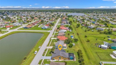 Enjoy a beautiful water view right from your front door with on Duffys Golf Center in Florida - for sale on GolfHomes.com, golf home, golf lot