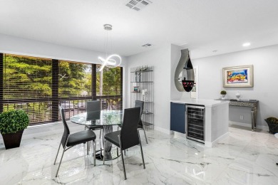This beautifully renovated 2-bedroom, 2-bath residence In the on Quail Ridge Golf Course and Country Club in Florida - for sale on GolfHomes.com, golf home, golf lot