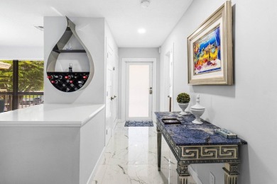 This beautifully renovated 2-bedroom, 2-bath residence In the on Quail Ridge Golf Course and Country Club in Florida - for sale on GolfHomes.com, golf home, golf lot