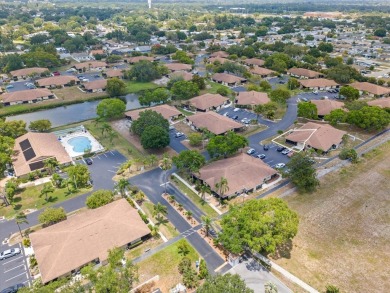 Discover the perfect blend of comfort, convenience, and coastal on Timber Creek Golf Course in Florida - for sale on GolfHomes.com, golf home, golf lot