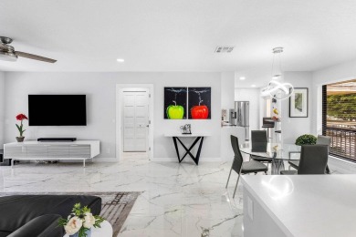 This beautifully renovated 2-bedroom, 2-bath residence In the on Quail Ridge Golf Course and Country Club in Florida - for sale on GolfHomes.com, golf home, golf lot