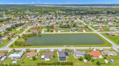 Enjoy a beautiful water view right from your front door with on Duffys Golf Center in Florida - for sale on GolfHomes.com, golf home, golf lot