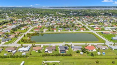 Enjoy a beautiful water view right from your front door with on Duffys Golf Center in Florida - for sale on GolfHomes.com, golf home, golf lot