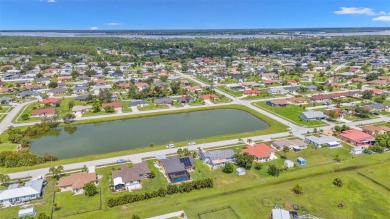 Enjoy a beautiful water view right from your front door with on Duffys Golf Center in Florida - for sale on GolfHomes.com, golf home, golf lot