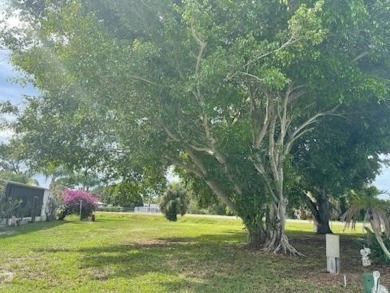 Vacant land in Barefoot Bay! Perfect for a permanent residence on Barefoot Bay Golf Course in Florida - for sale on GolfHomes.com, golf home, golf lot