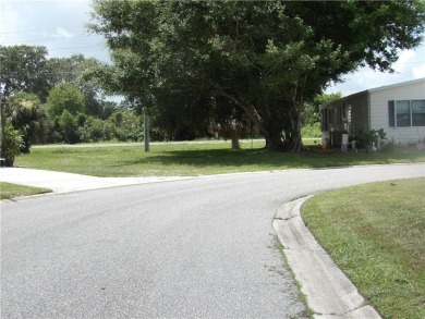 Vacant land in Barefoot Bay! Perfect for a permanent residence on Barefoot Bay Golf Course in Florida - for sale on GolfHomes.com, golf home, golf lot