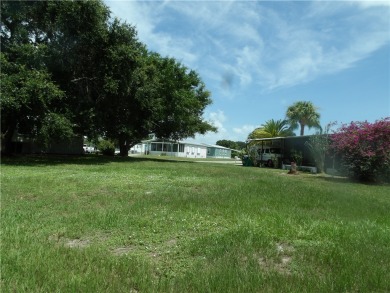 Vacant land in Barefoot Bay! Perfect for a permanent residence on Barefoot Bay Golf Course in Florida - for sale on GolfHomes.com, golf home, golf lot