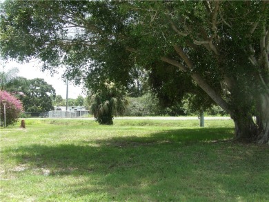 Vacant land in Barefoot Bay! Perfect for a permanent residence on Barefoot Bay Golf Course in Florida - for sale on GolfHomes.com, golf home, golf lot