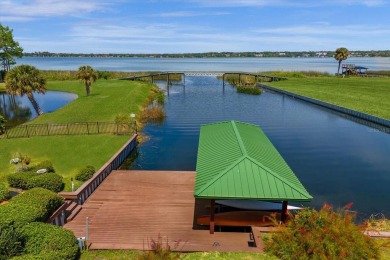 Luxurious lakeside living beckons you to your own private on Deer Island Country Club in Florida - for sale on GolfHomes.com, golf home, golf lot