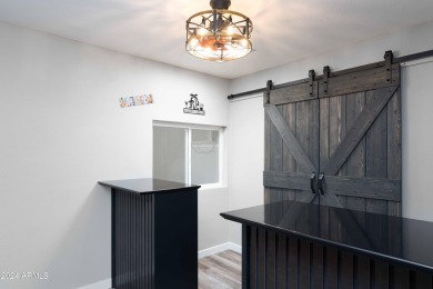 Discover this beautifully remodeled Sun City home in a thriving on Sun City Lakes West and East in Arizona - for sale on GolfHomes.com, golf home, golf lot