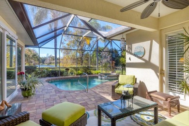 A captivating lake view with mature trees draws you in the on Legacy Golf Club in Florida - for sale on GolfHomes.com, golf home, golf lot