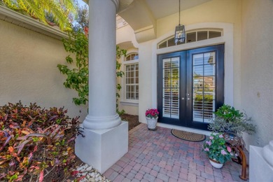 A captivating lake view with mature trees draws you in the on Legacy Golf Club in Florida - for sale on GolfHomes.com, golf home, golf lot