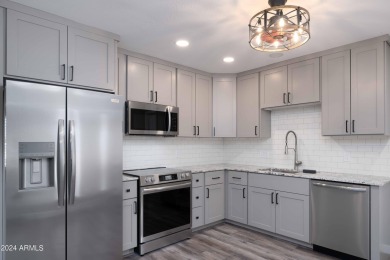 Discover this beautifully remodeled Sun City home in a thriving on Sun City Lakes West and East in Arizona - for sale on GolfHomes.com, golf home, golf lot