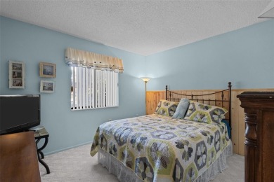 Welcome to 7535 Greystone Drive - a beautifully maintained END on Beacon Woods Golf Club in Florida - for sale on GolfHomes.com, golf home, golf lot