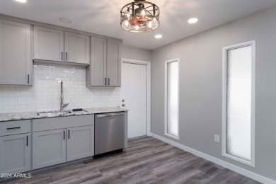 Discover this beautifully remodeled Sun City home in a thriving on Sun City Lakes West and East in Arizona - for sale on GolfHomes.com, golf home, golf lot