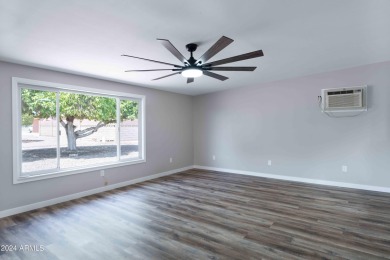 Discover this beautifully remodeled Sun City home in a thriving on Sun City Lakes West and East in Arizona - for sale on GolfHomes.com, golf home, golf lot