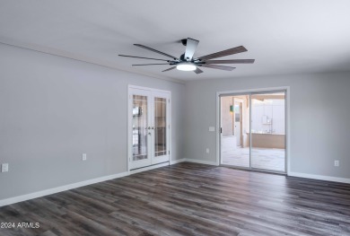 Discover this beautifully remodeled Sun City home in a thriving on Sun City Lakes West and East in Arizona - for sale on GolfHomes.com, golf home, golf lot