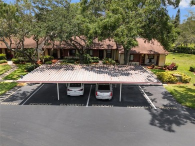 Welcome to 7535 Greystone Drive - a beautifully maintained END on Beacon Woods Golf Club in Florida - for sale on GolfHomes.com, golf home, golf lot