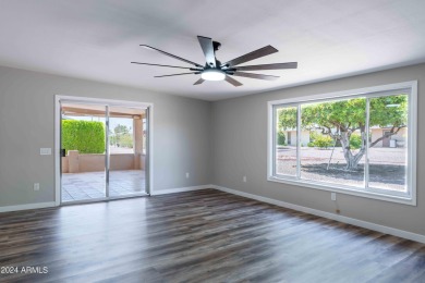 Discover this beautifully remodeled Sun City home in a thriving on Sun City Lakes West and East in Arizona - for sale on GolfHomes.com, golf home, golf lot